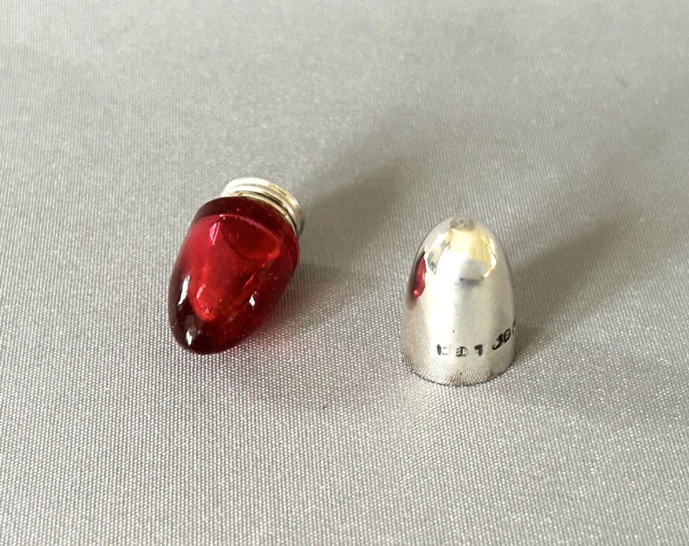 A Victorian novelty silver & cranberry glass 'bullet' scent bottle View II