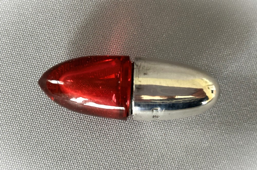 A Victorian novelty silver & cranberry glass 'bullet' scent bottle View V