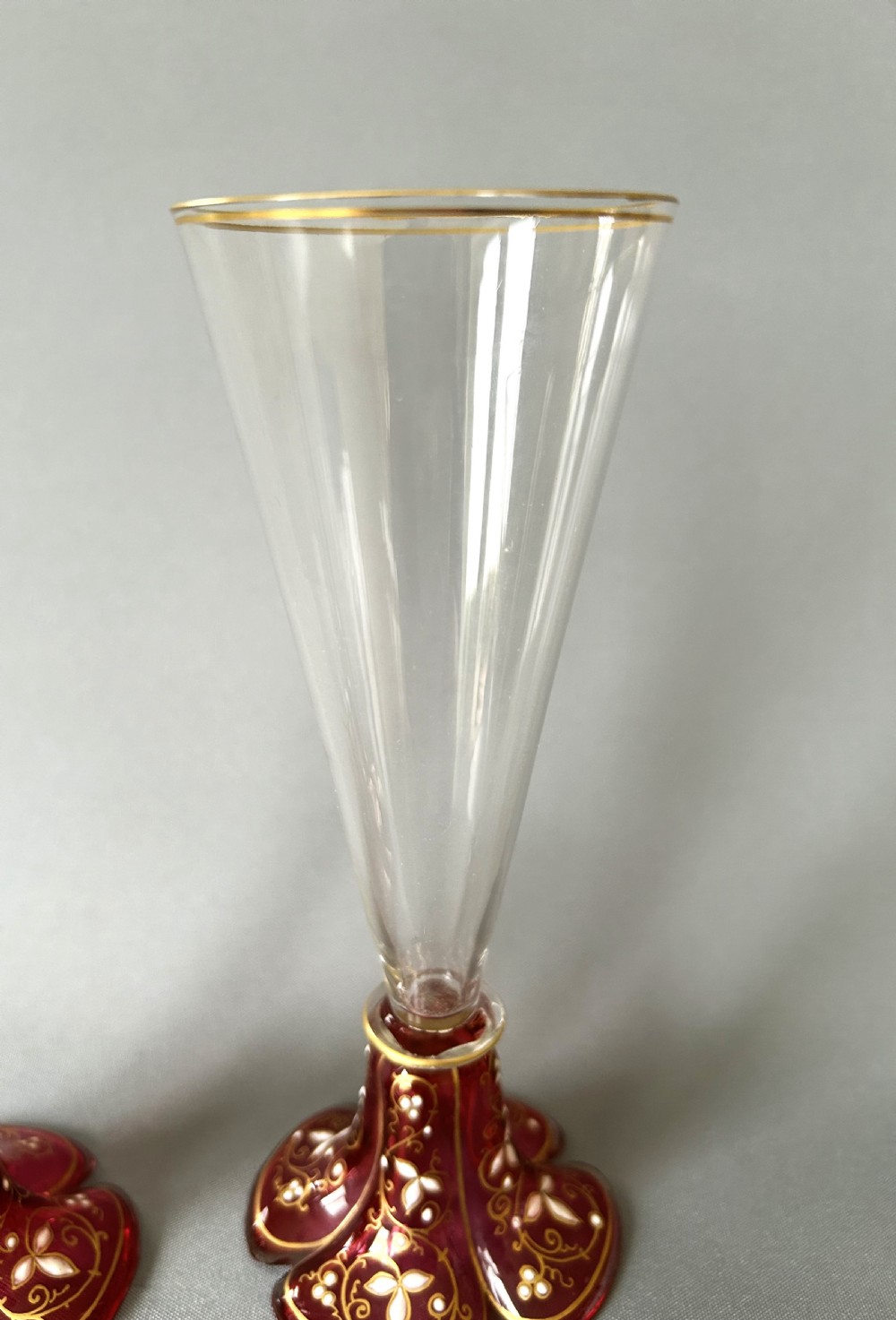 A fabulous pair of Moser enamel decorated champagne flutes View VI