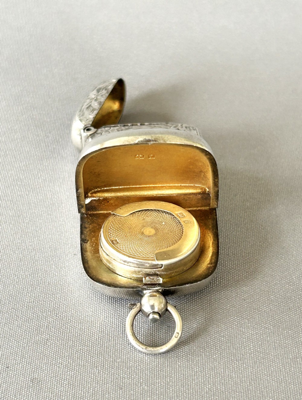 A superb Edwardian silver vesta/sovereign case combo View II