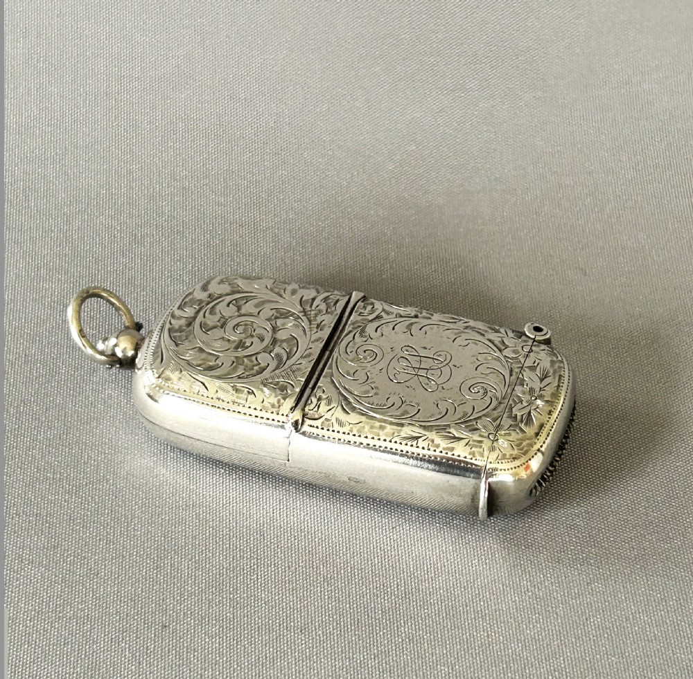 A superb Edwardian silver vesta/sovereign case combo View III
