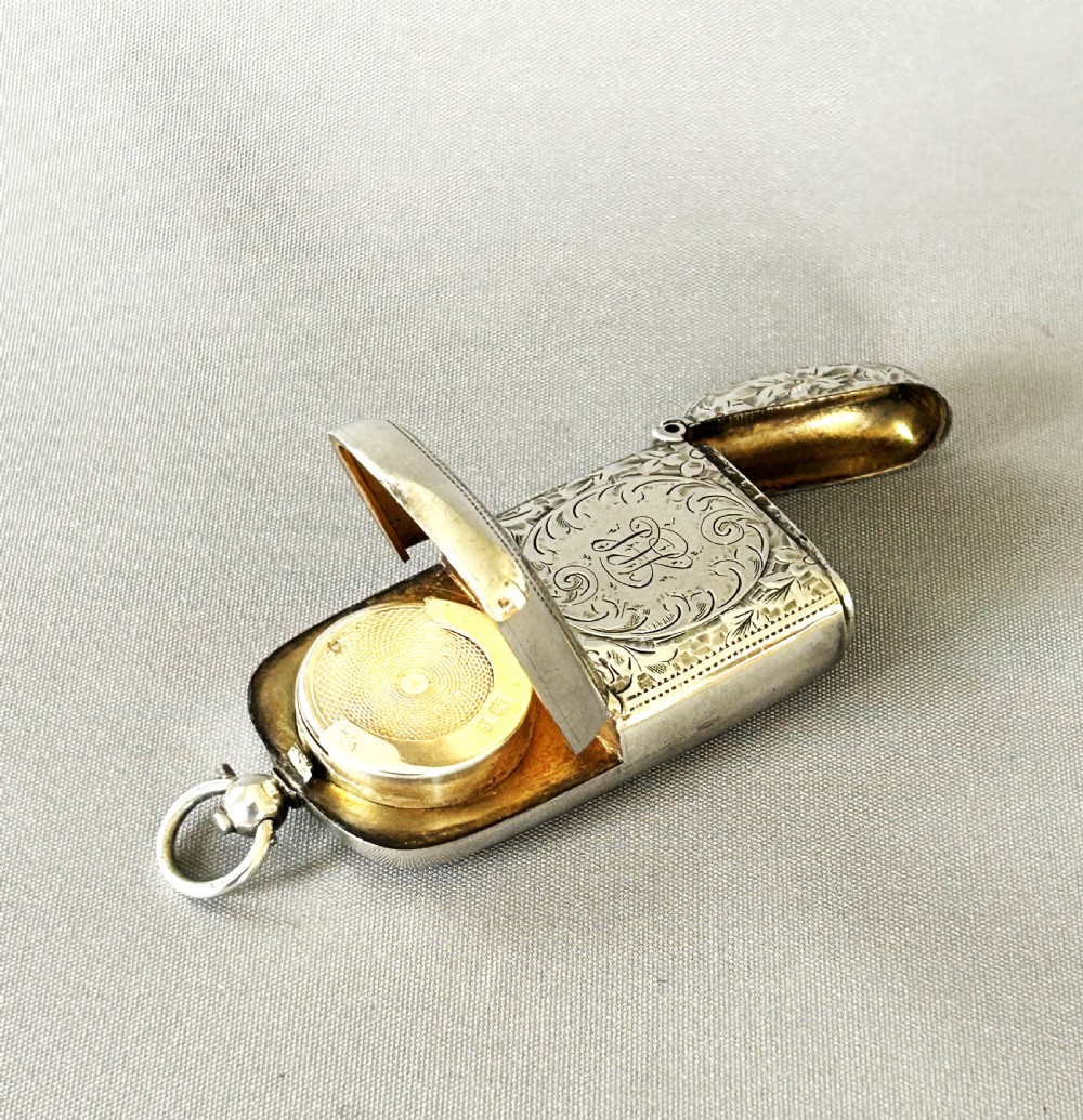 A superb Edwardian silver vesta/sovereign case combo View IV
