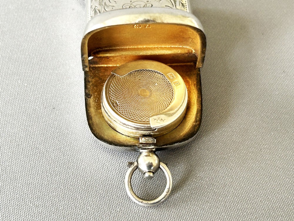 A superb Edwardian silver vesta/sovereign case combo View VII
