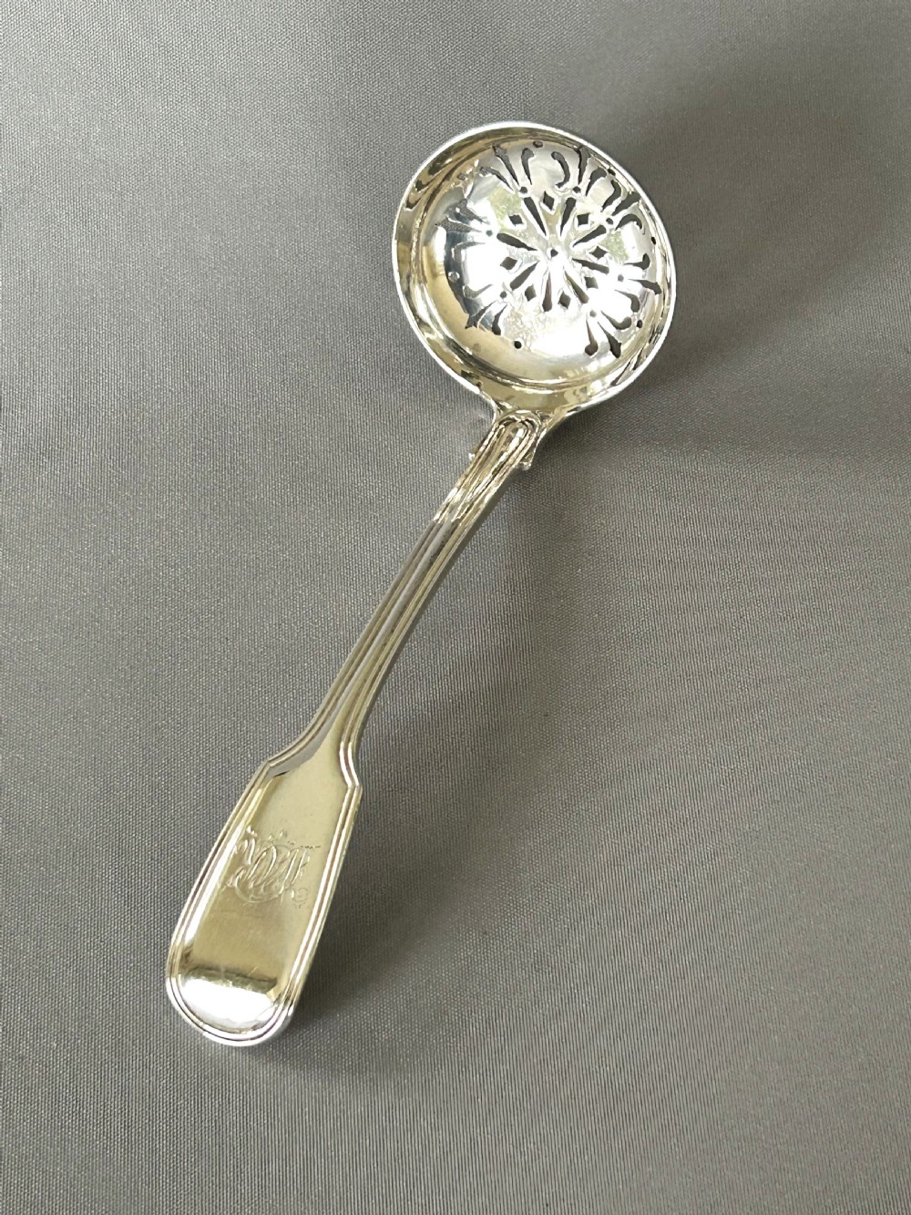 A Newcastle silver Fiddle & Thread sifter spoon View III