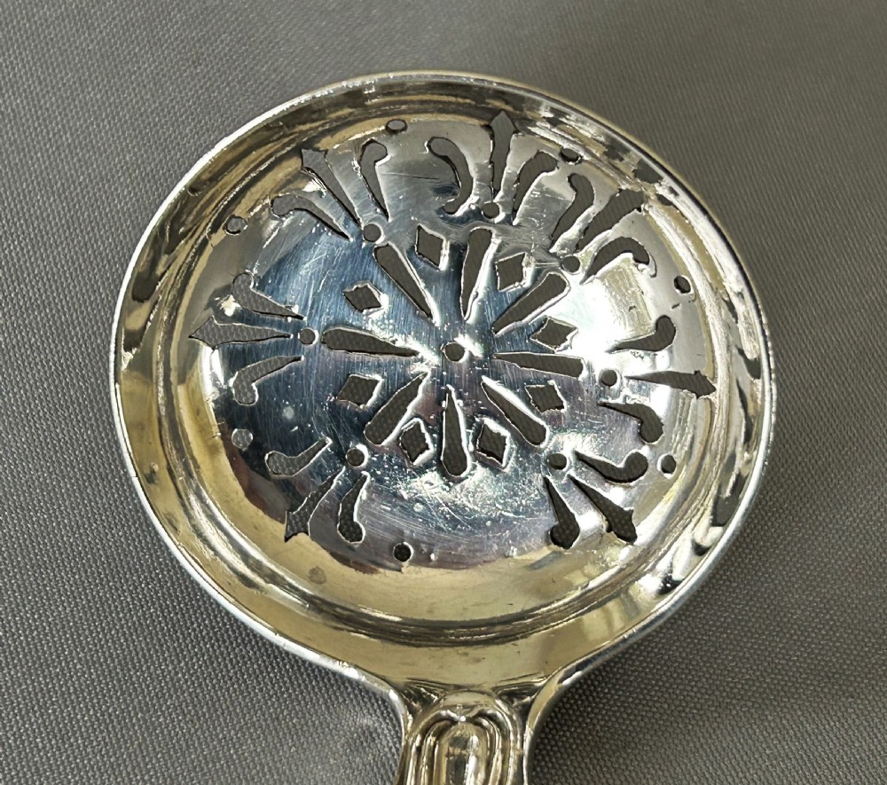 A Newcastle silver Fiddle & Thread sifter spoon View V