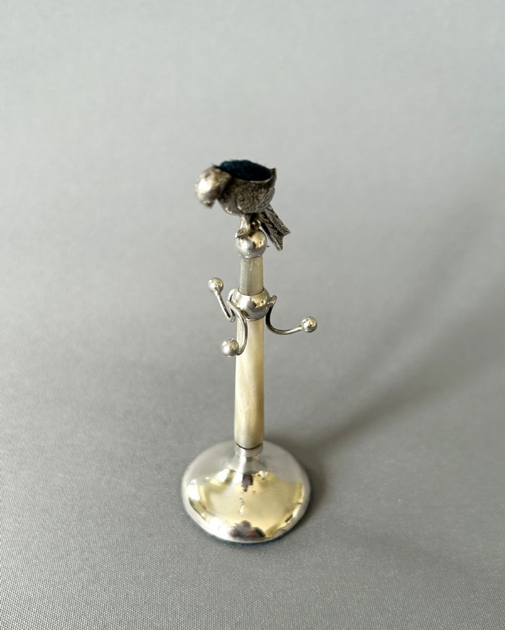 An extremely rare silver parrot pin cushion/ring tree View III