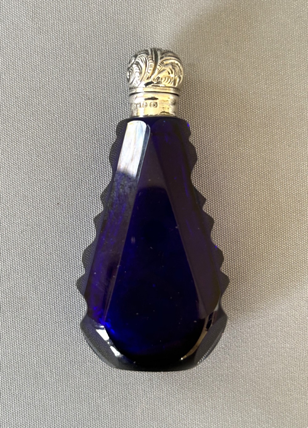 An unusual Victorian silver mounted scent bottle in Bristol Blue View III