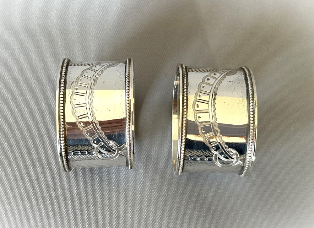 A rare pair of Victorian boxed silver napkin rings View III
