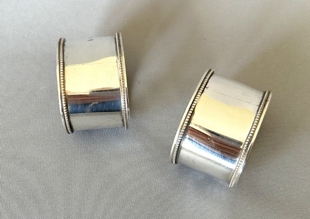 A rare pair of Victorian boxed silver napkin rings View IV