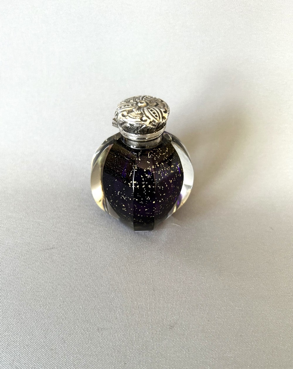 A fabulous Victorian silver mounted scent bottle with gold leaf View II