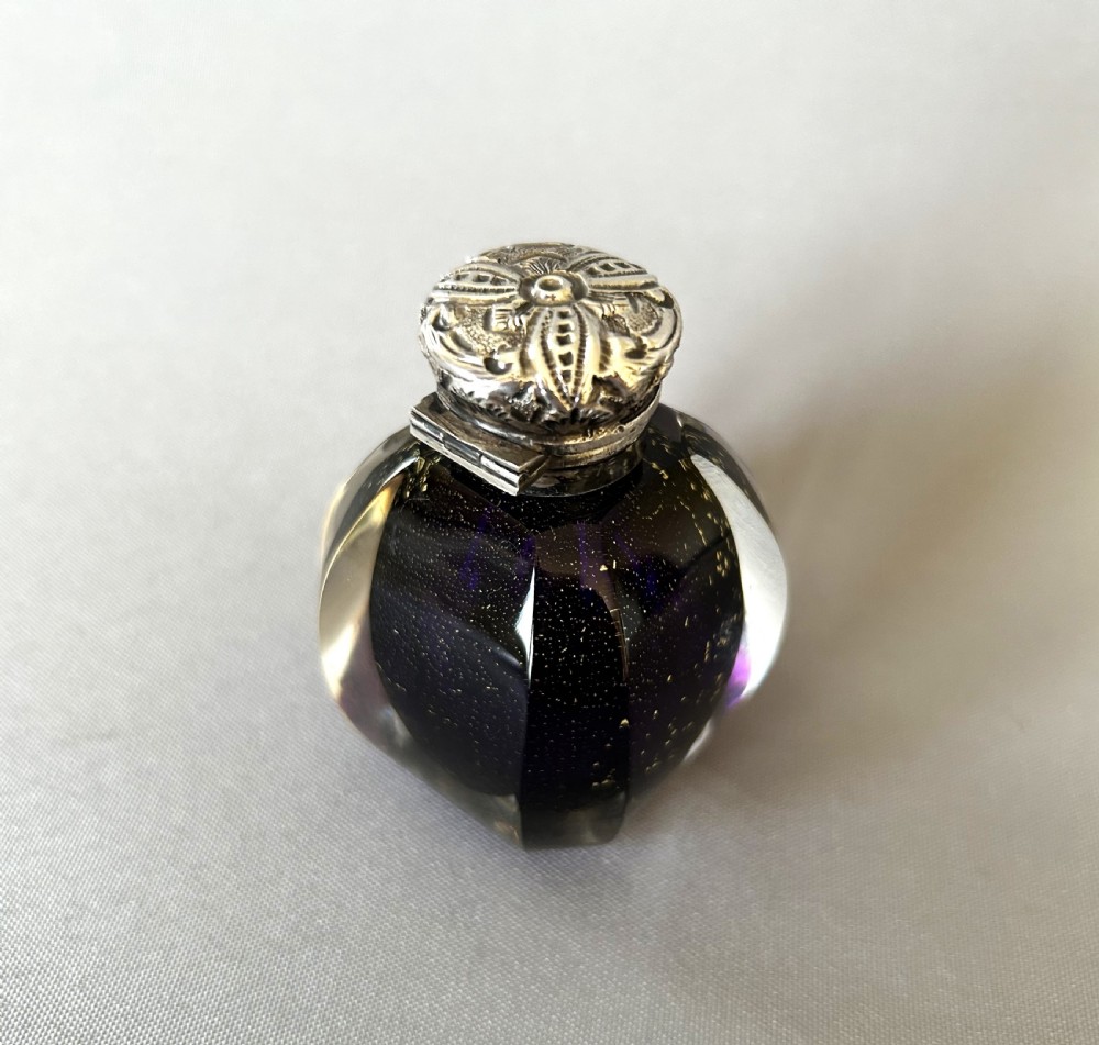 A fabulous Victorian silver mounted scent bottle with gold leaf View VII