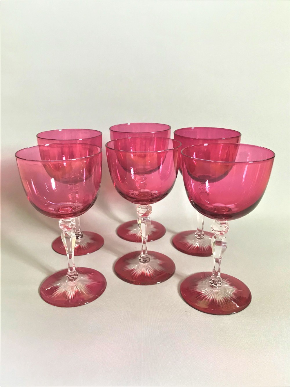A superb set of 6 Victorian cranberry wine glasses
