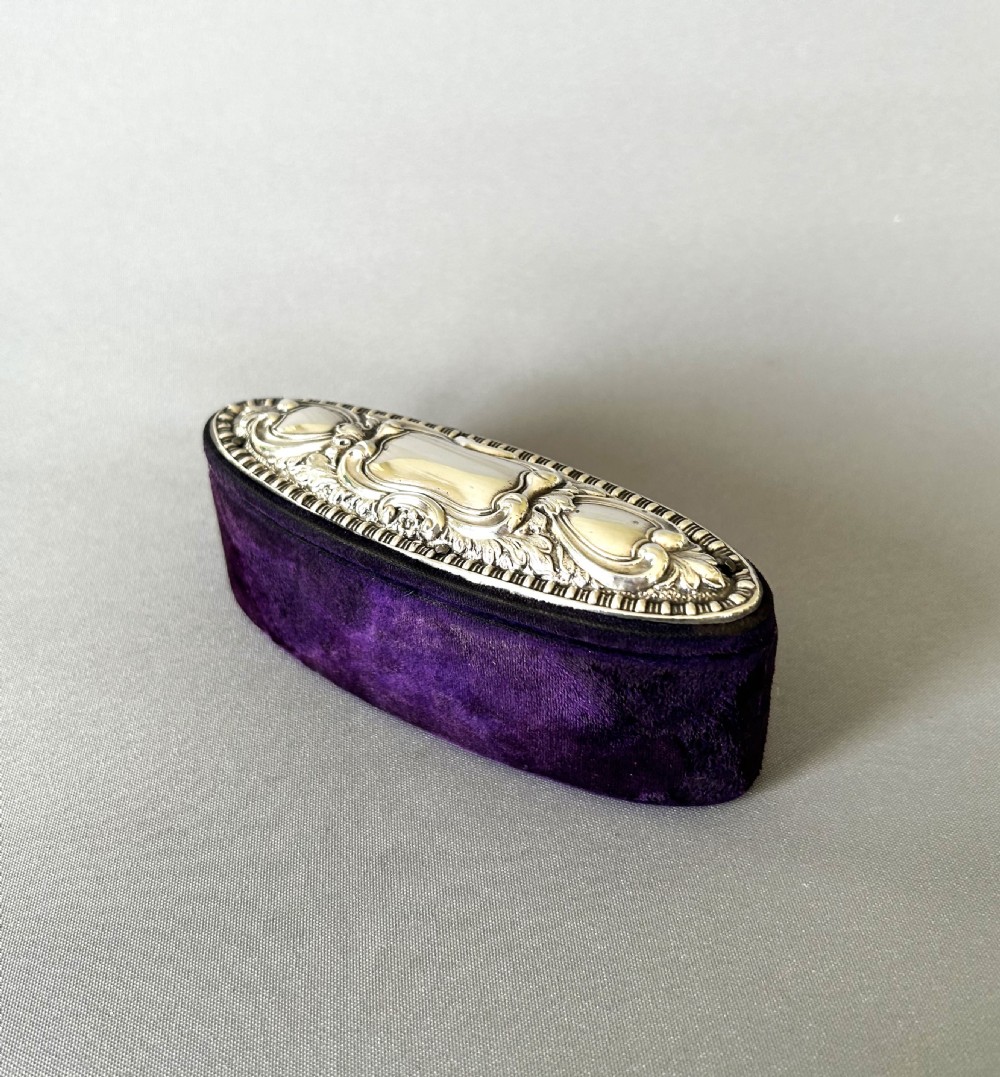 A charming Edwardian silver mounted trinket box
