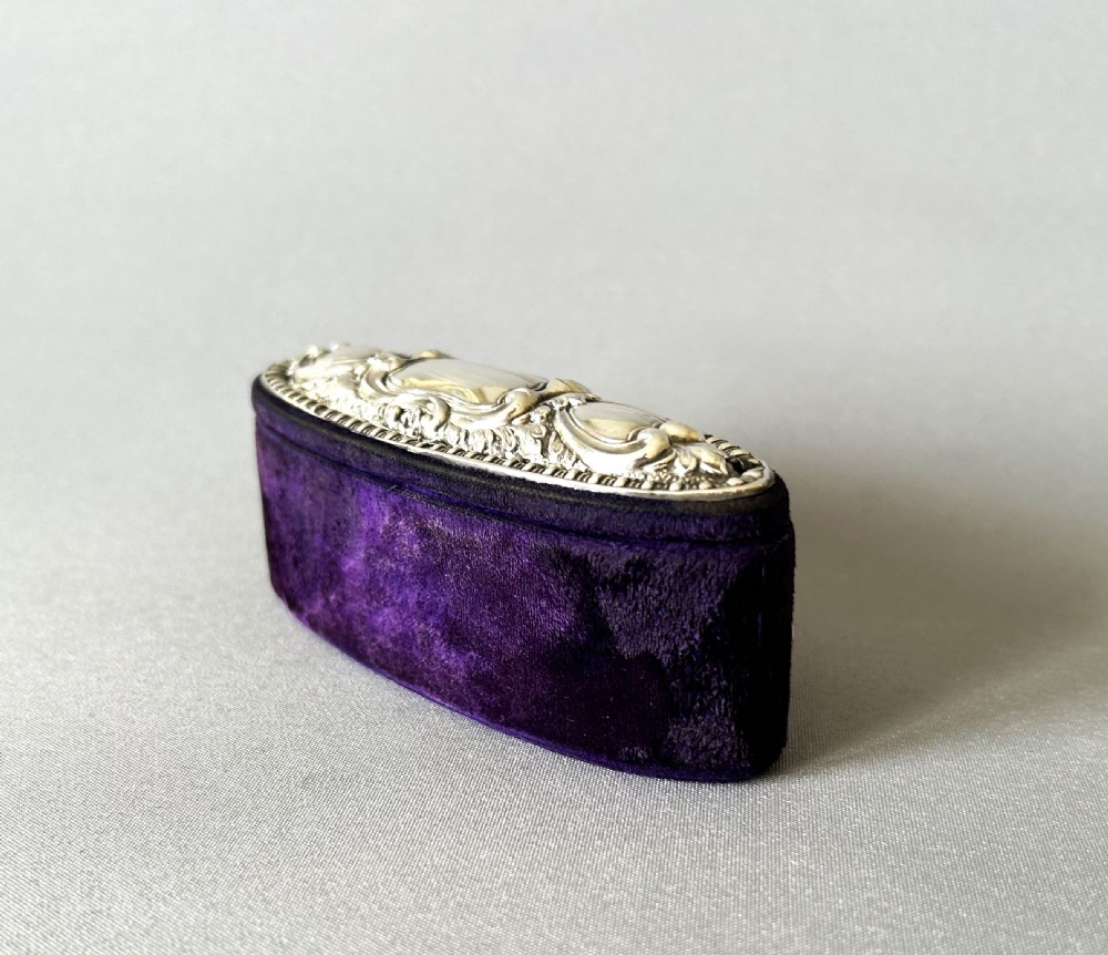 A charming Edwardian silver mounted trinket box View II
