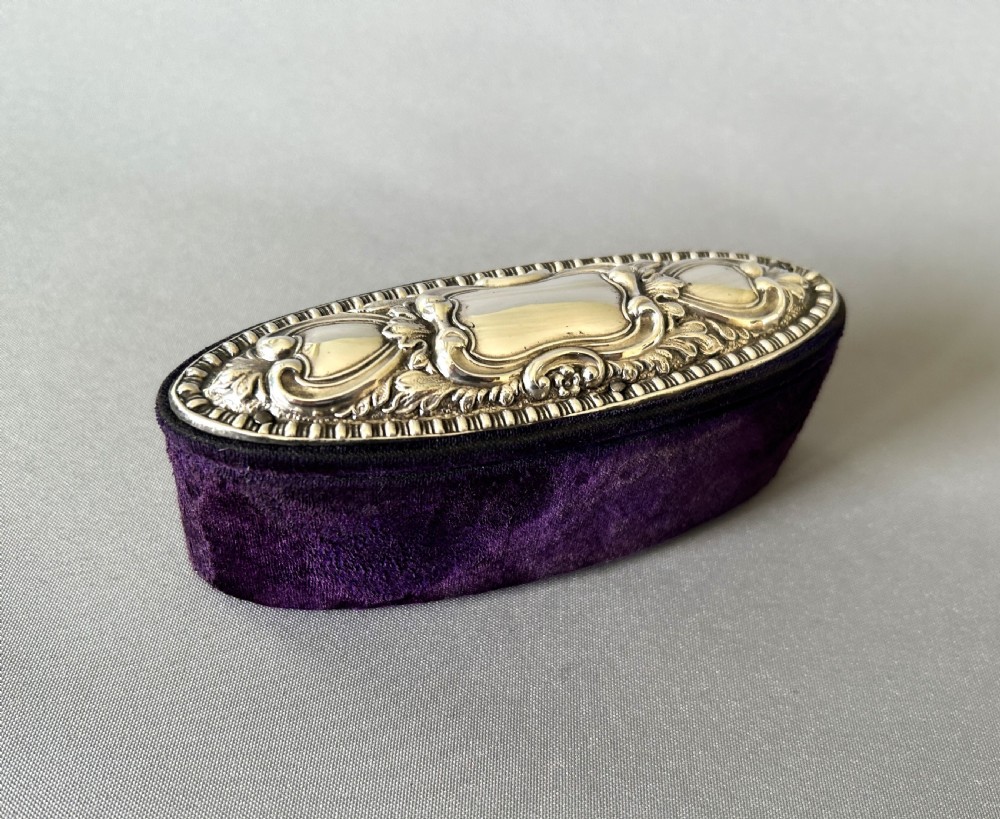 A charming Edwardian silver mounted trinket box View IV