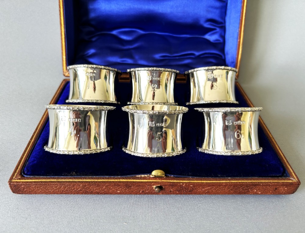 A handsome set of 6 boxed and numbered silver napkin rings View III