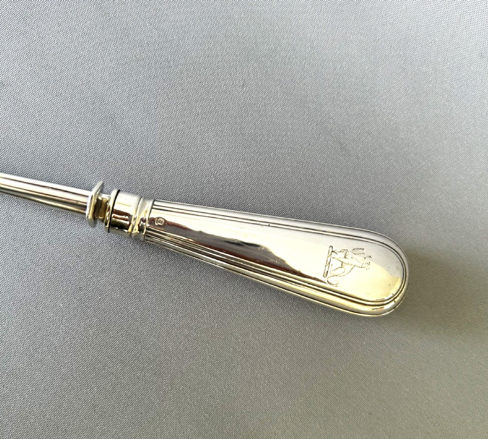 A fabulous Georgian mechanised silver stilton scoop View IV