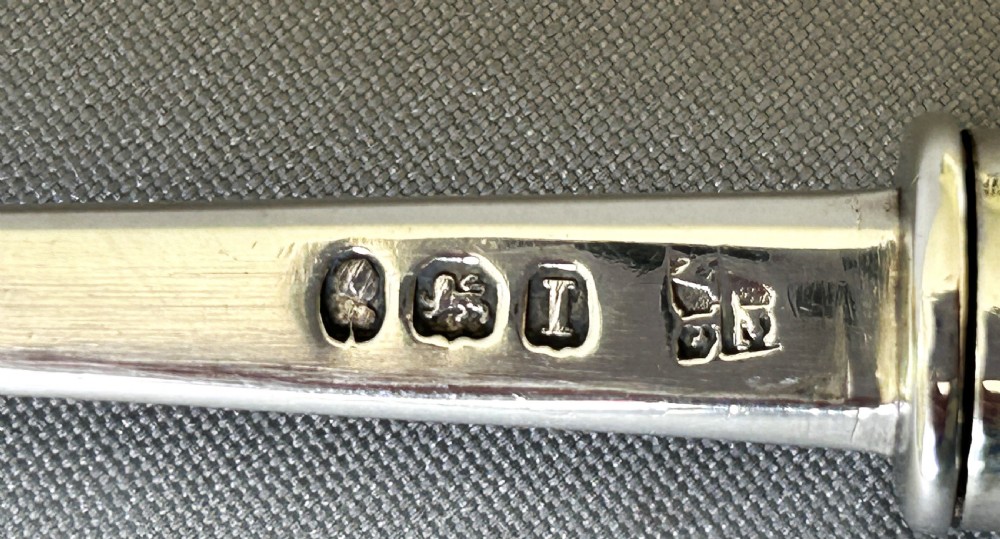 A fabulous Georgian mechanised silver stilton scoop View V