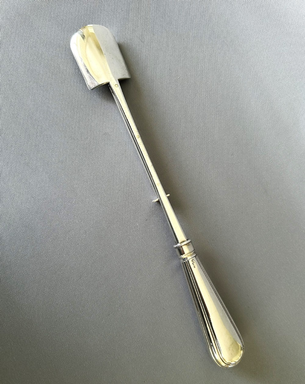 A fabulous Georgian mechanised silver stilton scoop View VII