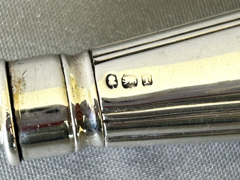 A fabulous Georgian mechanised silver stilton scoop View VIII