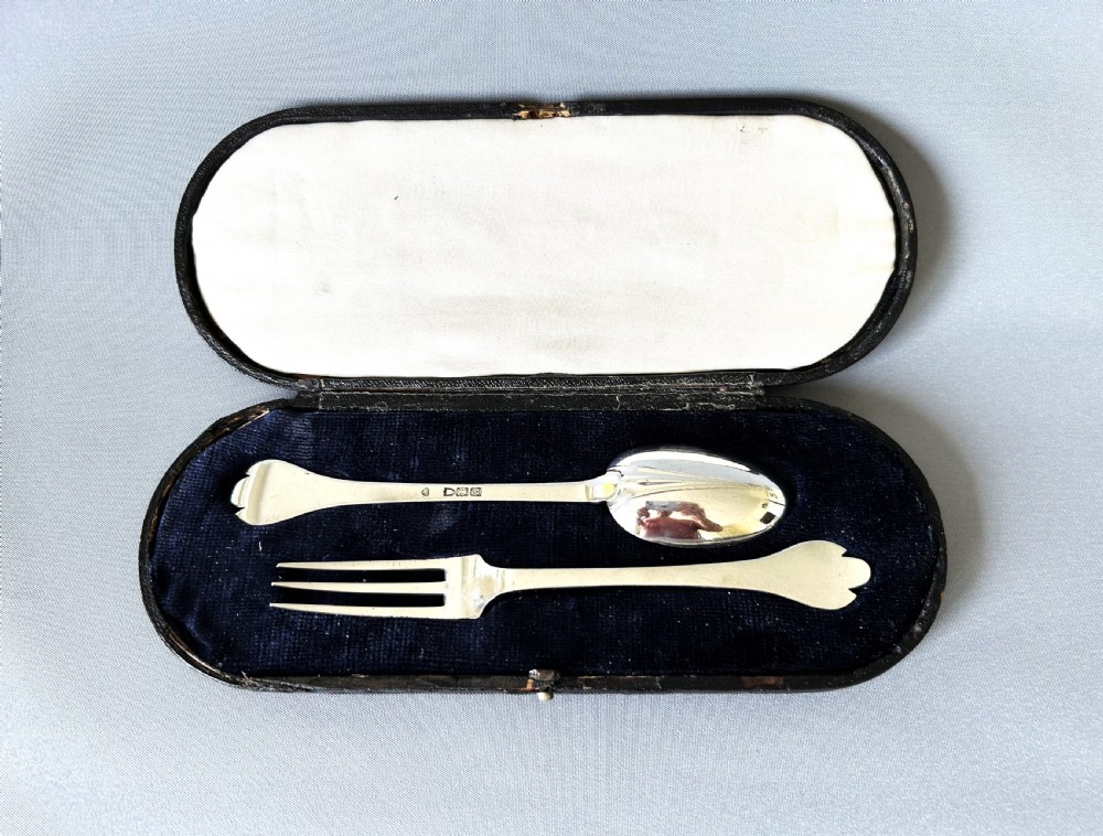 A gorgeous boxed silver Christening set