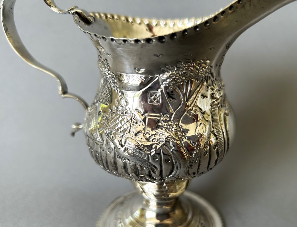 A gorgeous 18th Century silver cream jug View III