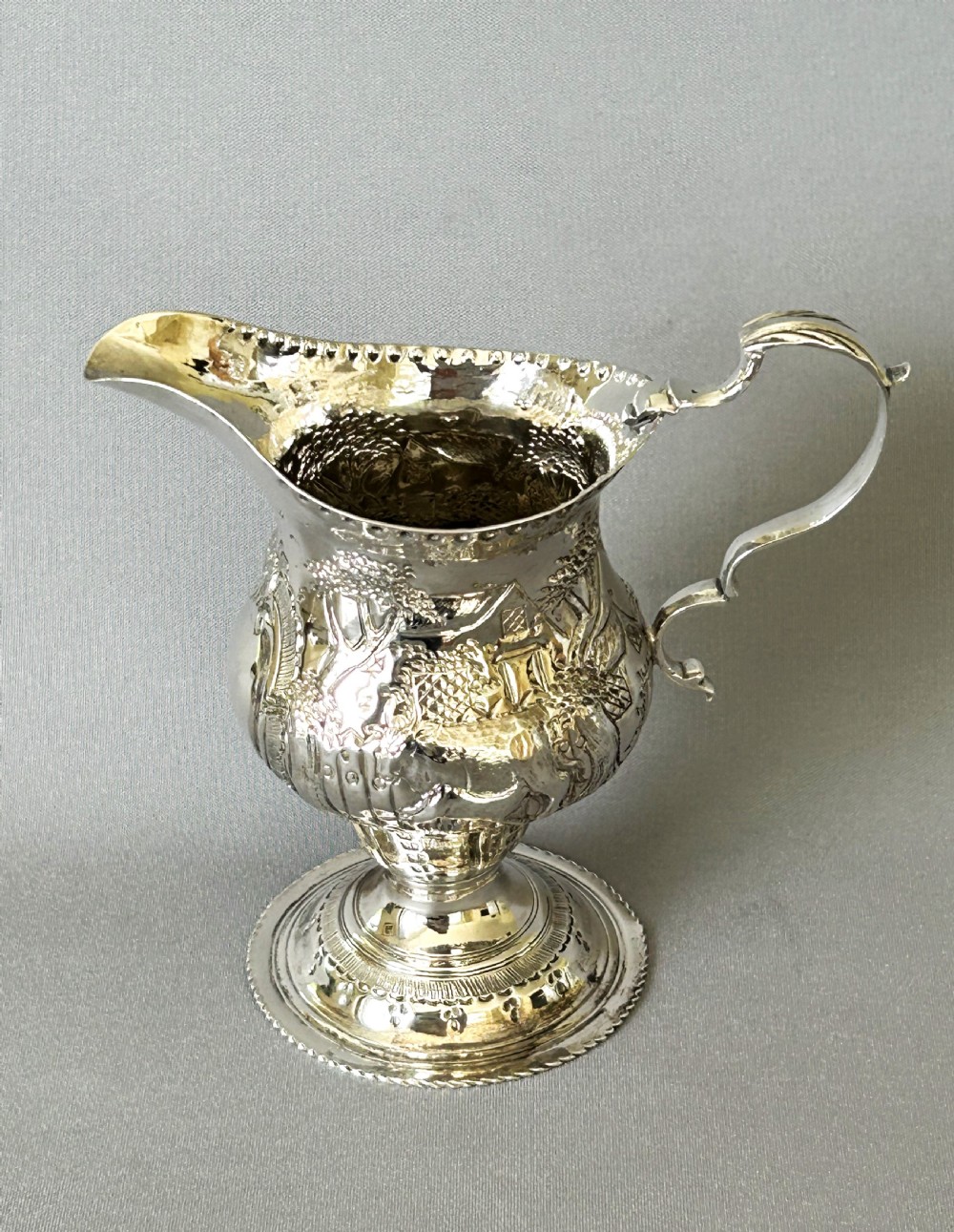 A gorgeous 18th Century silver cream jug View VIII