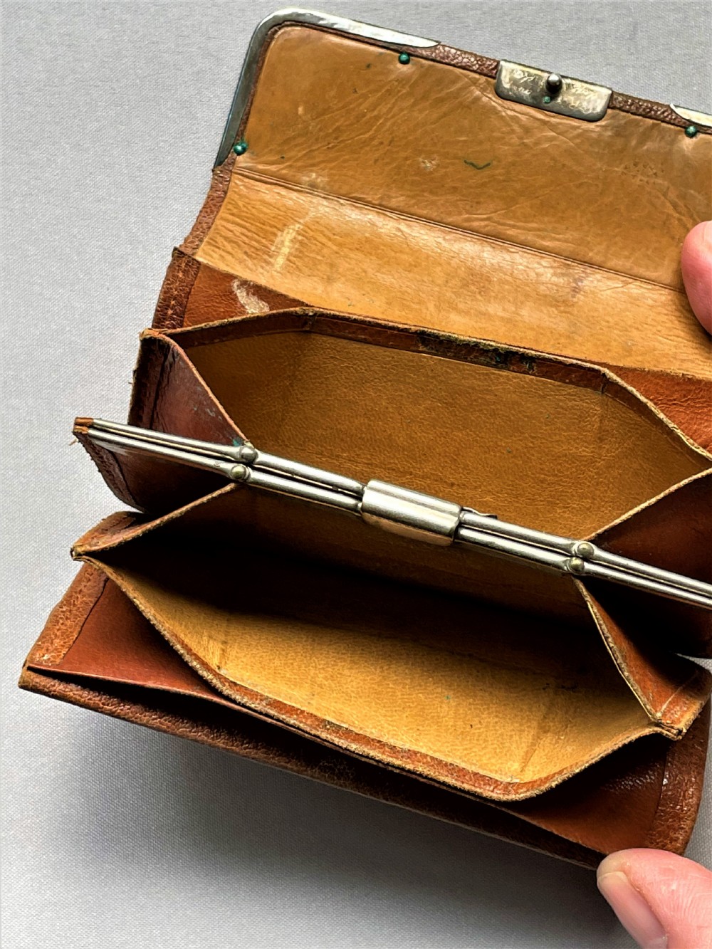 An Edwardian leather silver mounted purse/wallet View V