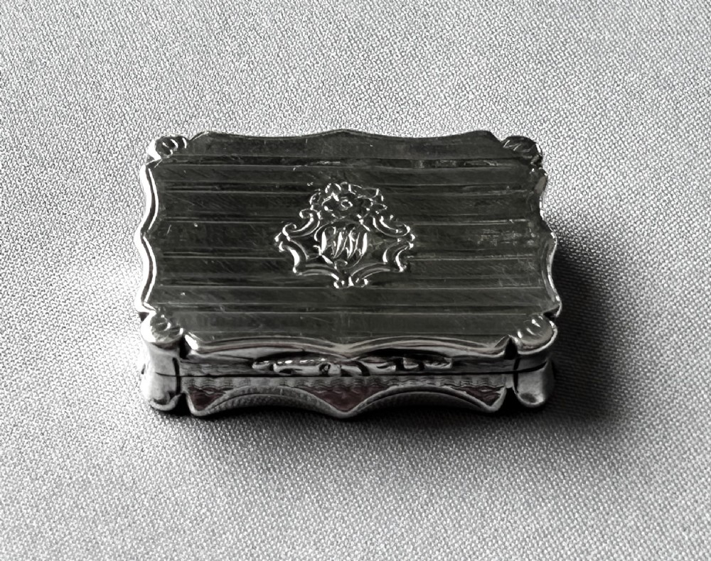 A superb Nathaniel Mills silver gilt vinaigrette