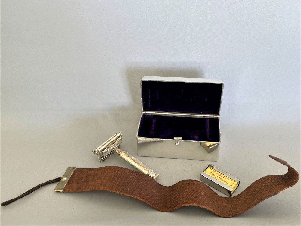 An outstanding silver cased shaving set by Sampson Morden View V