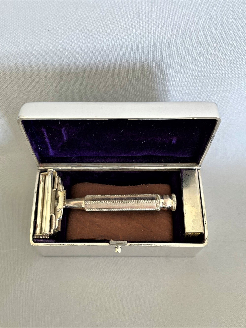 An outstanding silver cased shaving set by Sampson Morden View VI
