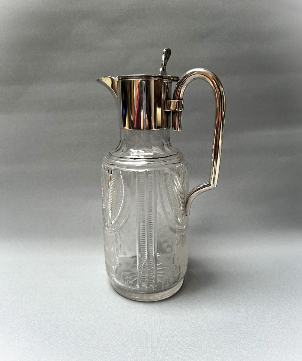 A gorgeous Victorian silver plated & cut glass claret jug
