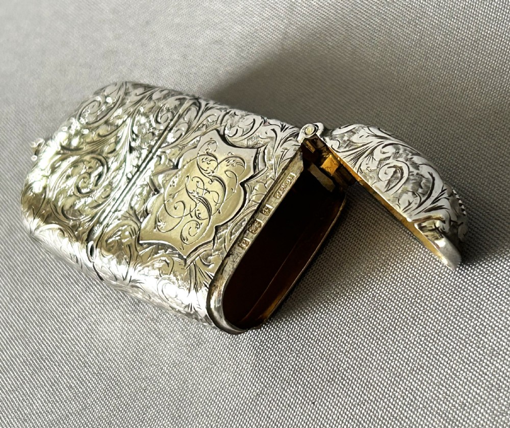 A collectible Victorian silver sovereign case/vesta combo View IX