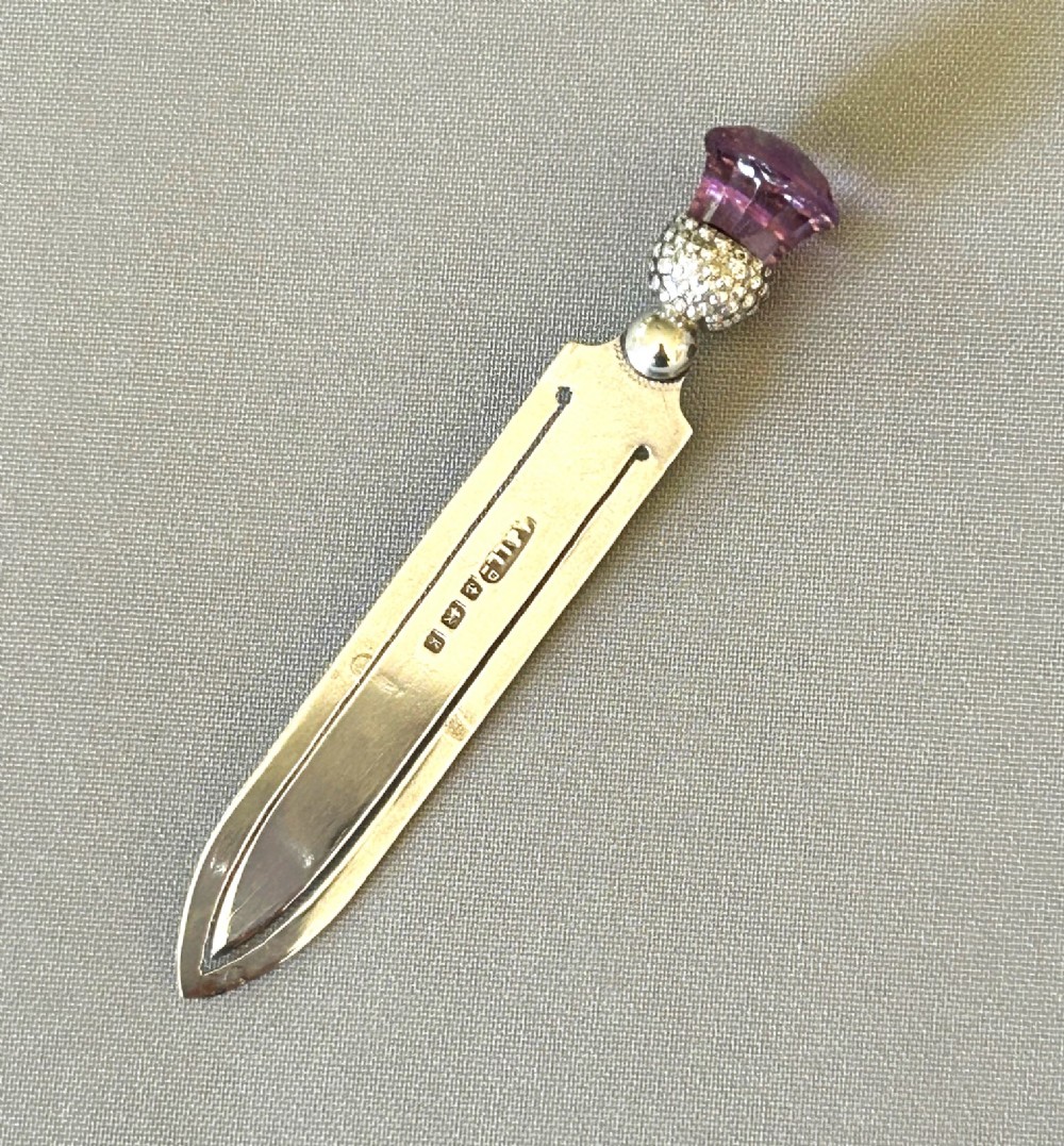 An Edwardian silver & amethyst thistle bookmark