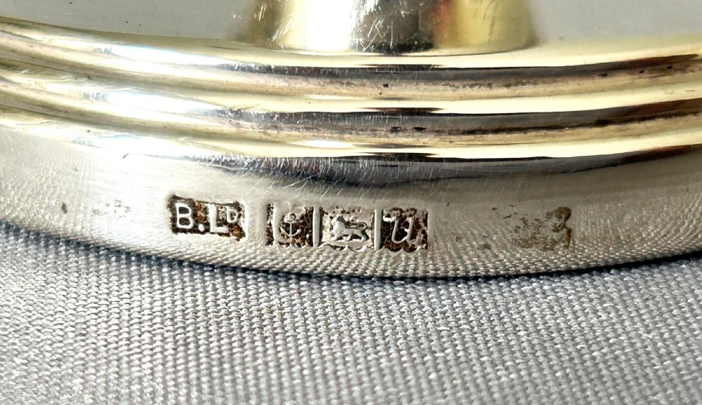 A charming pair of silver dwarf candlesticks View IV