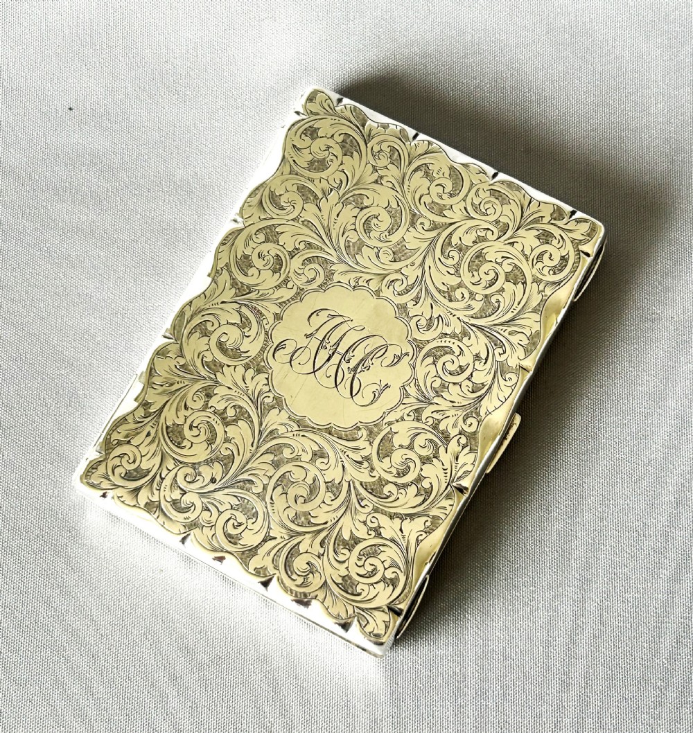 A fabulous Victorian silver wallet/notebook combo