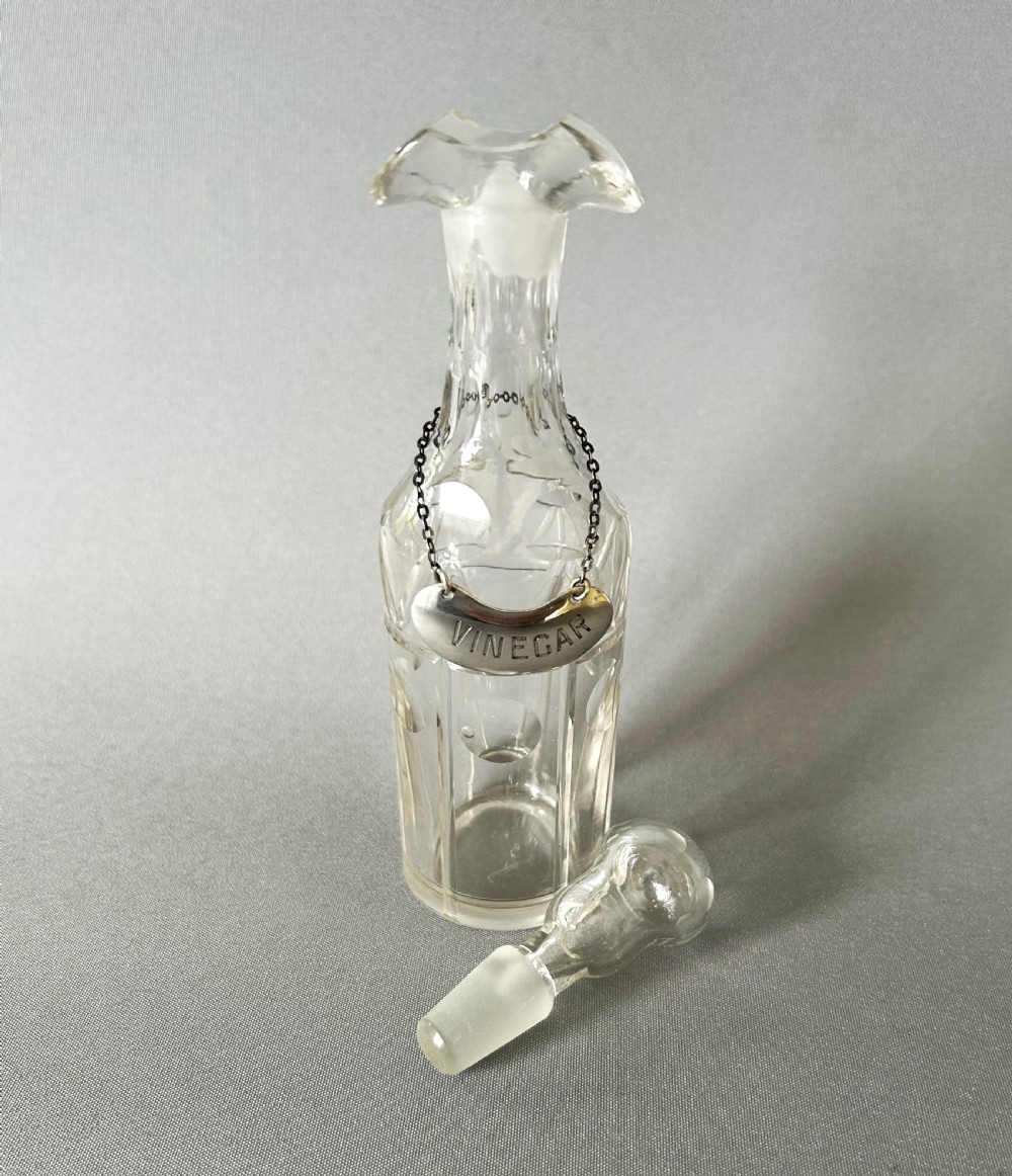 An unusual Edwardian cut glass vinegar bottle & silver label View IV