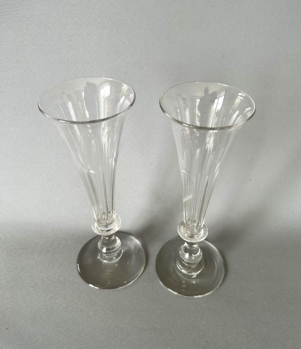 A pair of early Victorian cut glass champagne flutes View II
