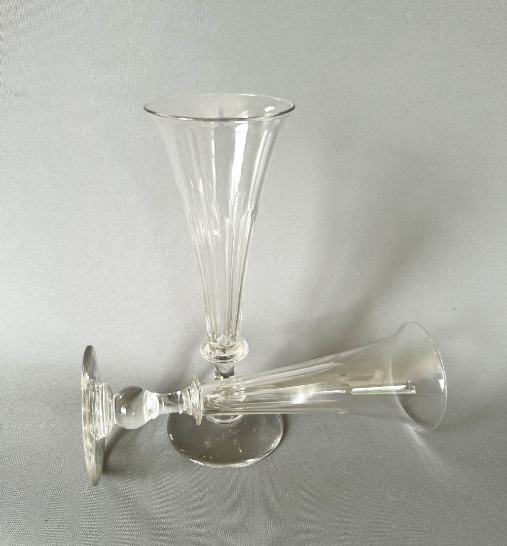 A pair of early Victorian cut glass champagne flutes View V