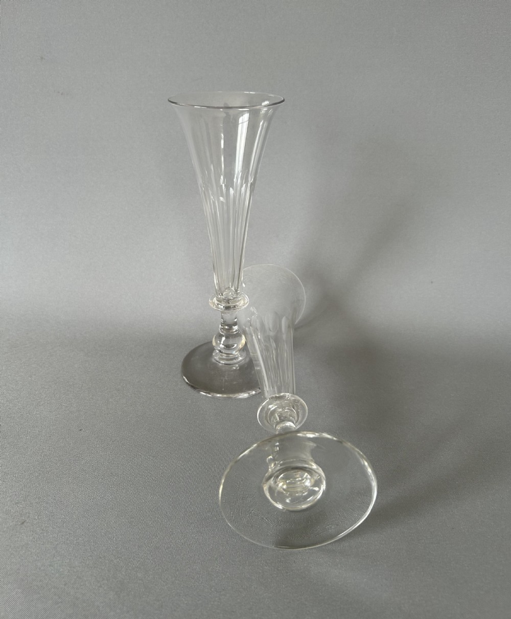 A pair of early Victorian cut glass champagne flutes View VI