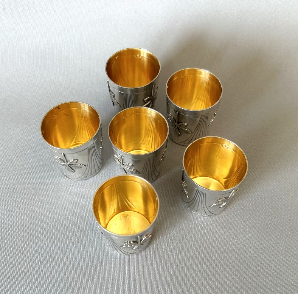 A wonderful set of 6 Parisian silver gilt shot glasses View IX