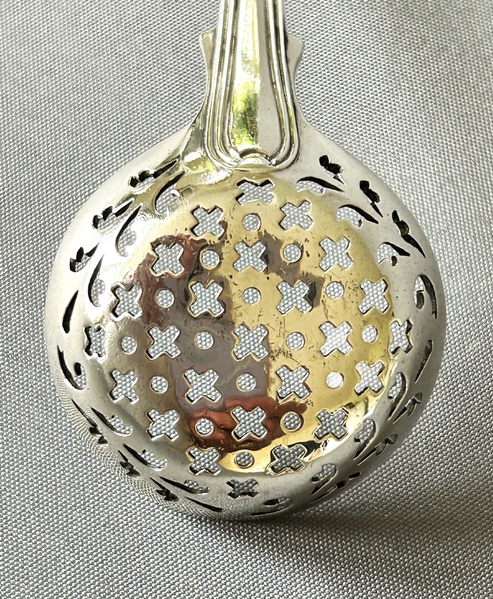 A superb Georgian silver Fiddle & Thread sifter spoon View VII
