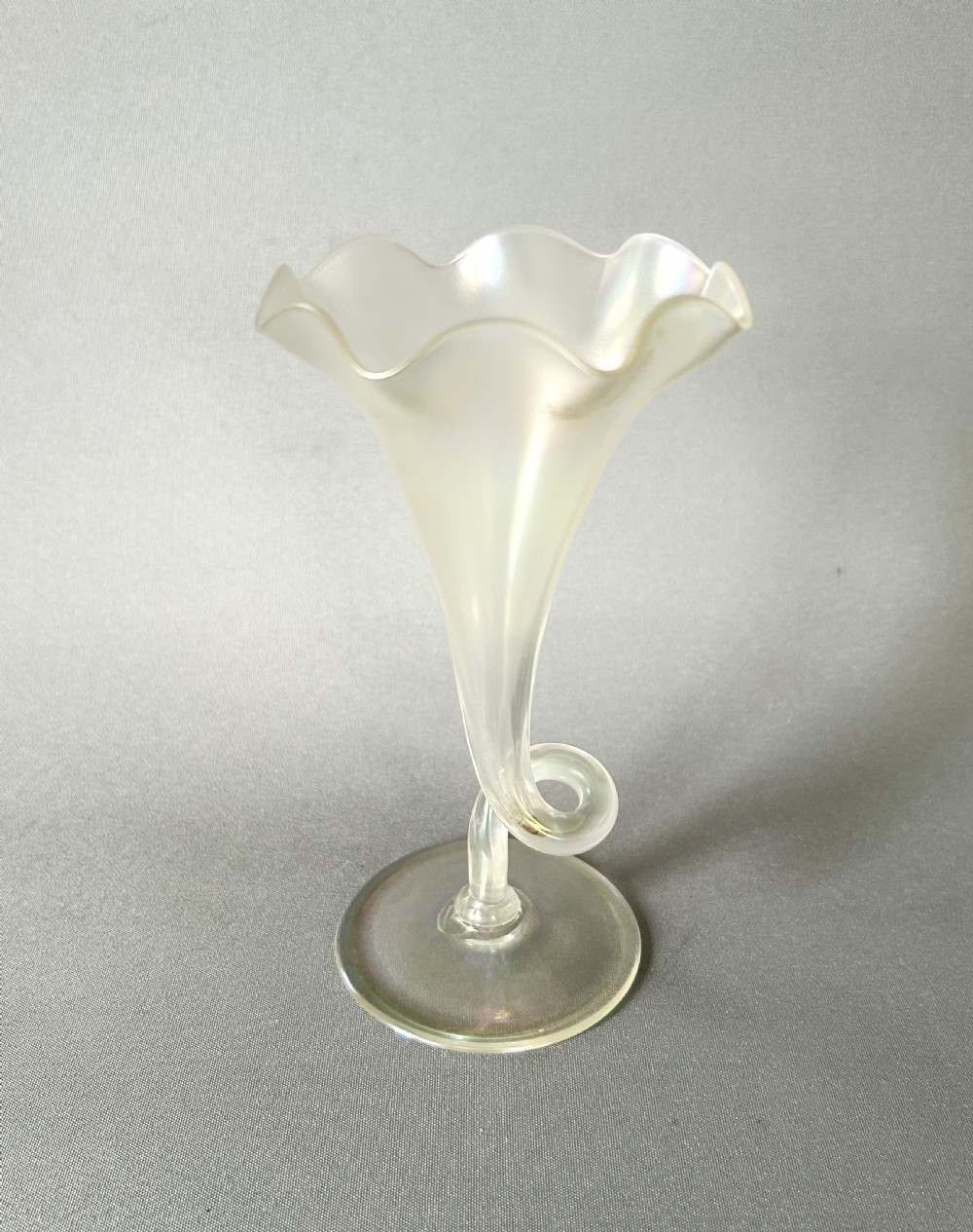 An Art Nouveau iridescent glass posy vase