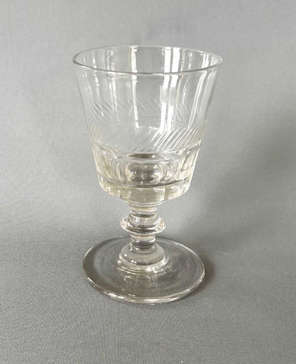 A handsome early Victorian cut glass wine bucket