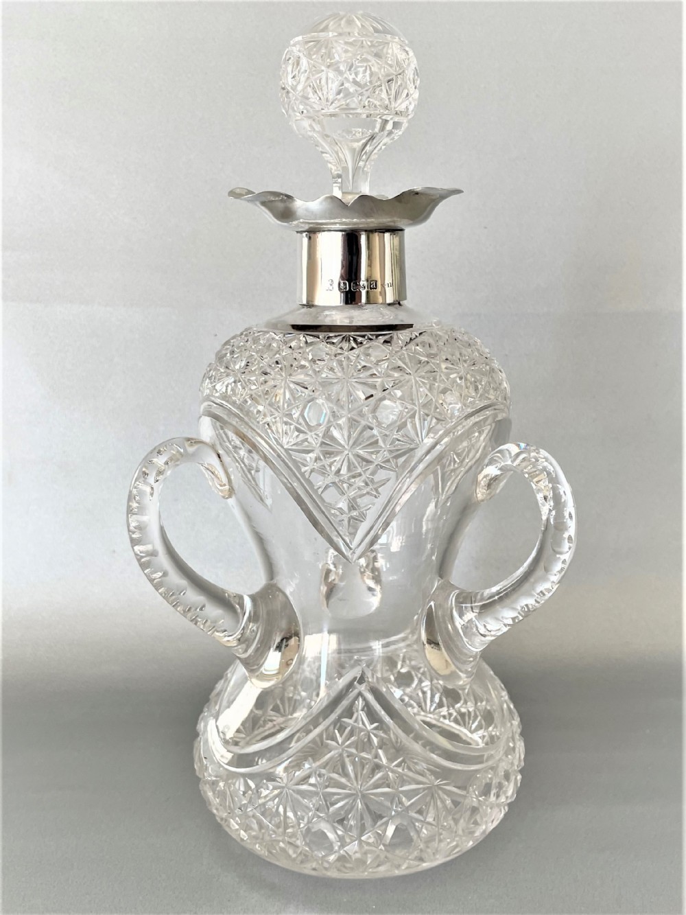 Superb late Victorian silver mounted cut glass decanter