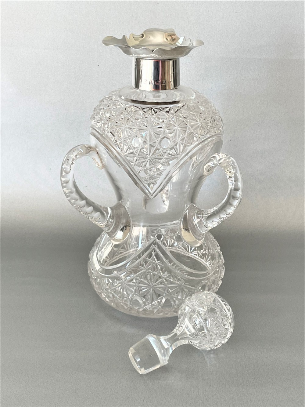 Superb late Victorian silver mounted cut glass decanter View VII