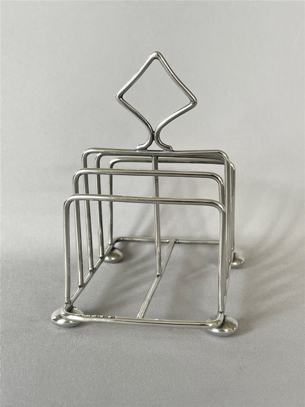 A stylish Edwardian silver toast rack View IV