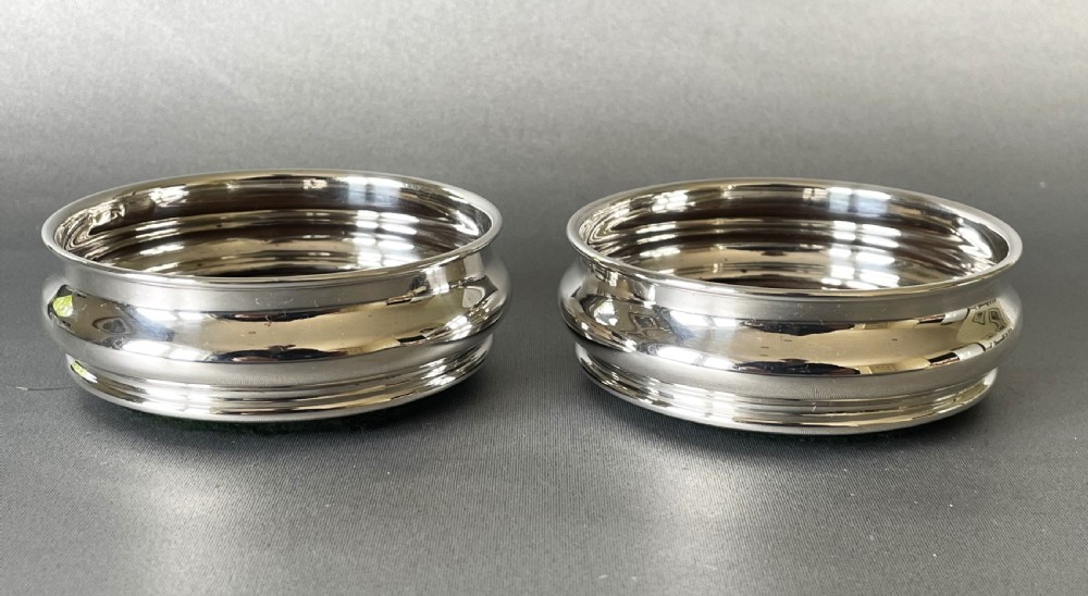 A Fine Pair Of Edwardian Individual Silver Coasters View II