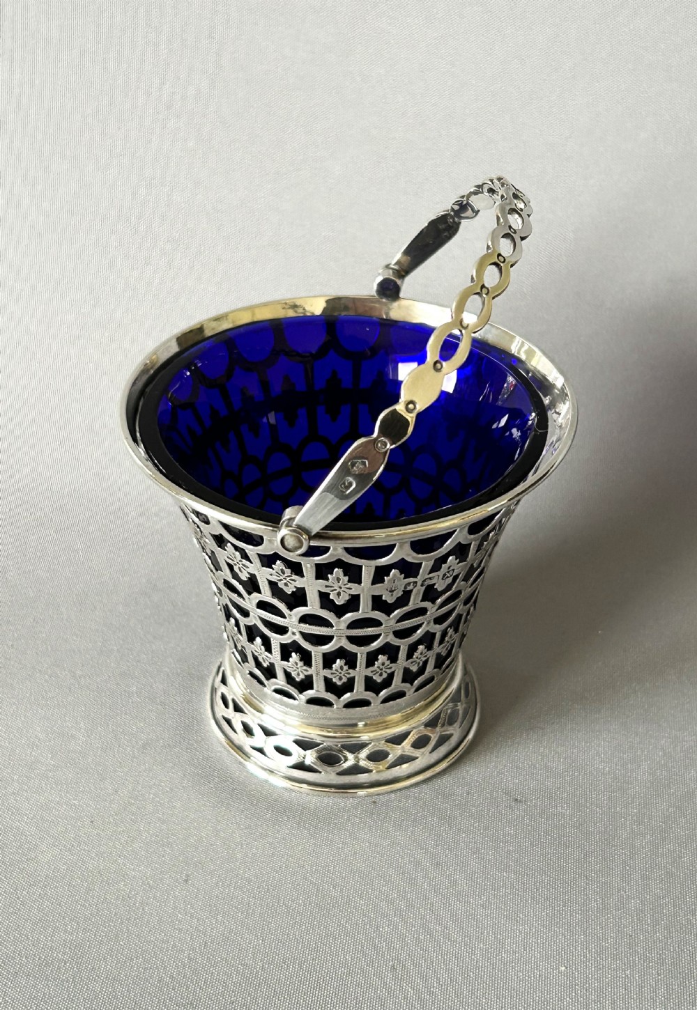 A late Victorian silver swing handled basket View IX
