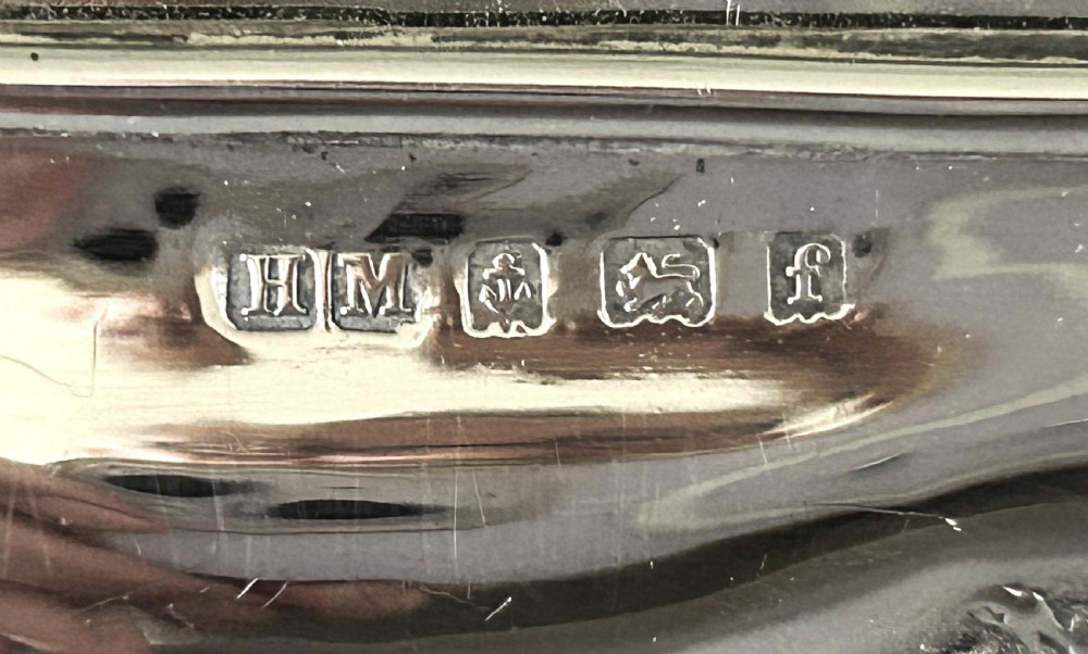 A handsome Edwardian silver table mirror View II